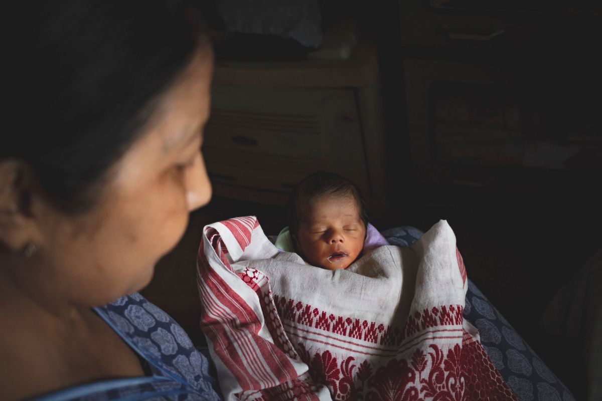 Mother with her newborn baby