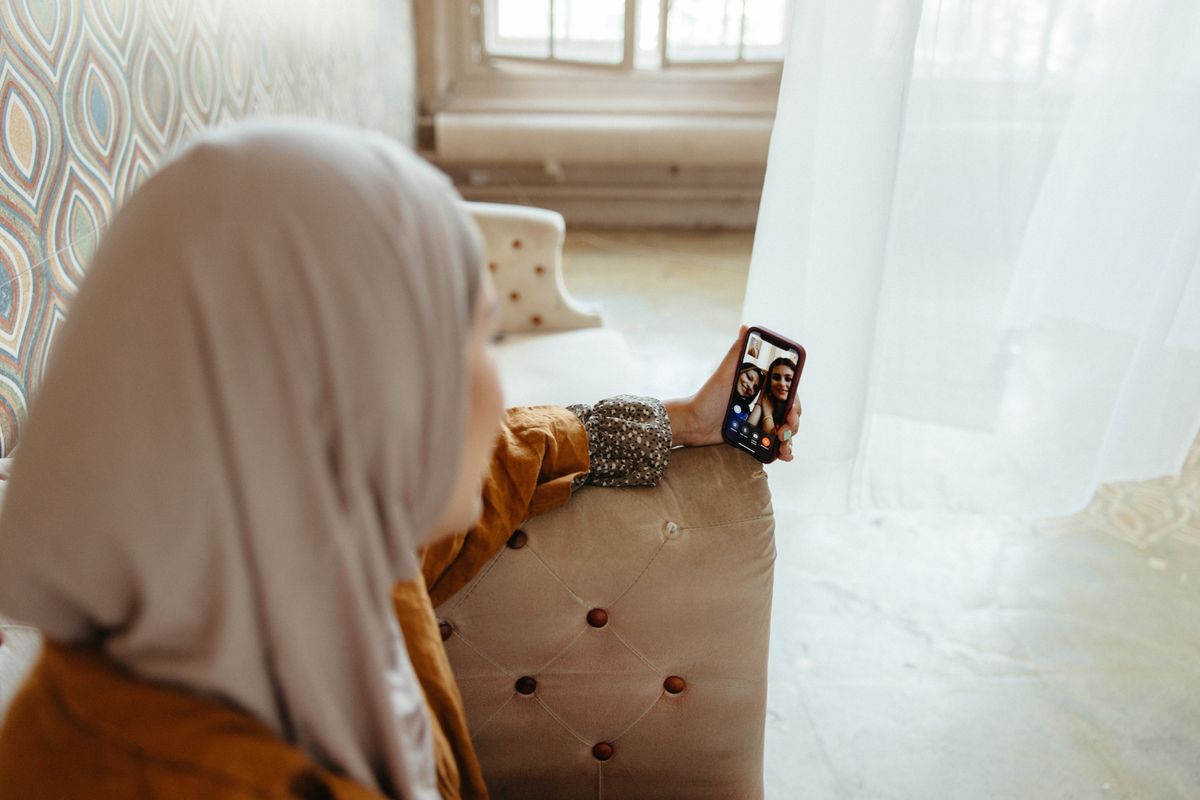 Woman joining a video call from home