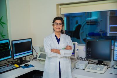 Indian woman clinician in a diagnostic setting